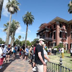 People gather on the front lawn